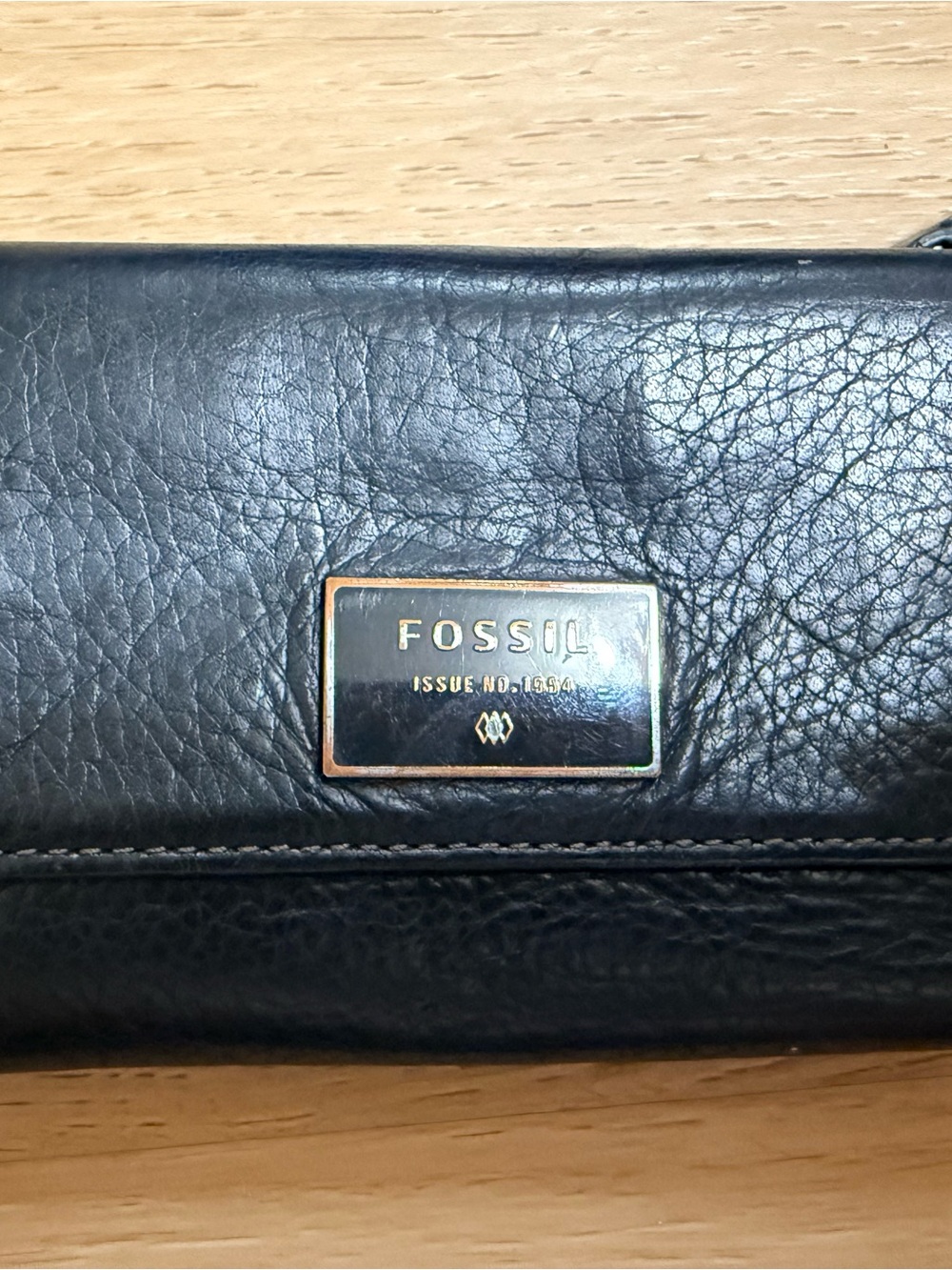 Fossil Black Leather Wallet with Gold Logo Plate
